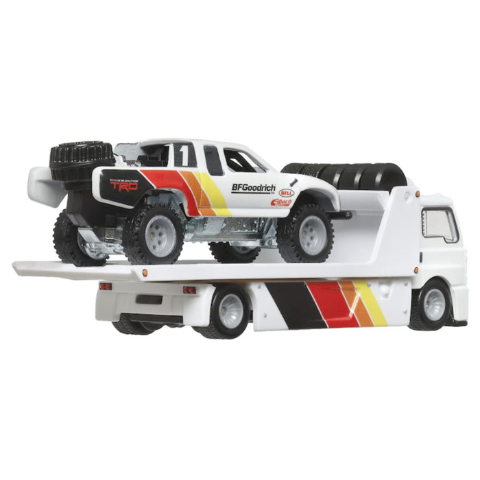 Set 2 Masinute Hot Wheels - Transportator Fleet Street cu Toyota Off Road Truck Scara 1:64