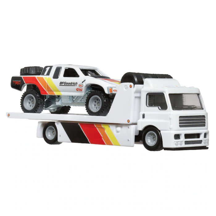 Set 2 Masinute Hot Wheels - Transportator Fleet Street cu Toyota Off Road Truck Scara 1:64